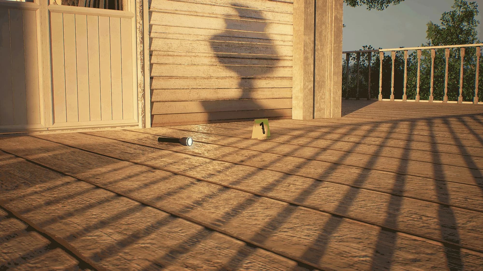 A torch lying on a sunlit porch beside a yellow evidence marker